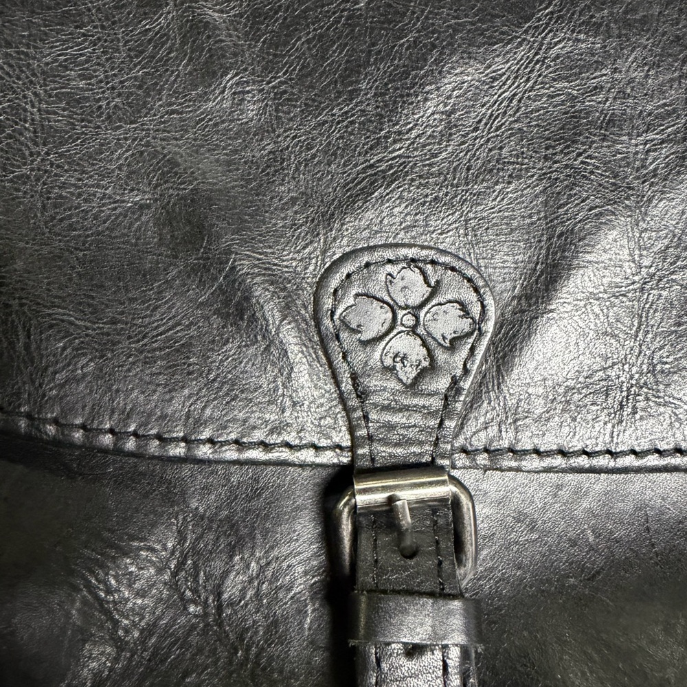 Gorgeous Patricia Nash Black Leather Saddle Bag with front and back pockets!